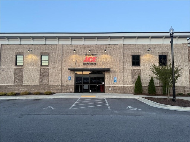view of property with uncovered parking