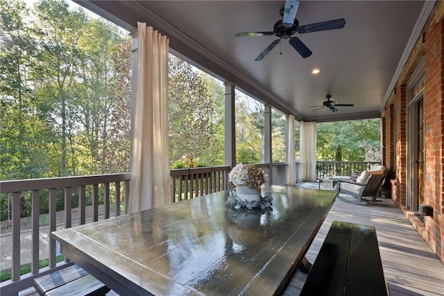 wooden terrace with ceiling fan