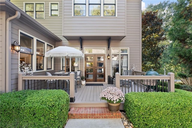 doorway to property with a wooden deck