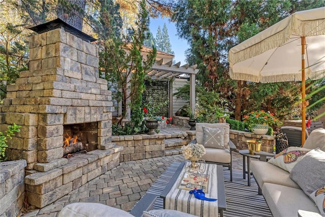 view of patio / terrace featuring an outdoor living space with a fireplace