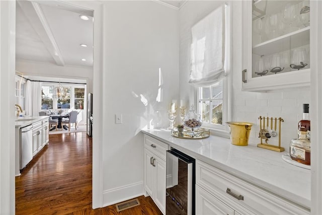 bar featuring white cabinetry, dishwasher, wine cooler, dark hardwood / wood-style flooring, and decorative backsplash