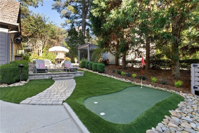 view of yard with a pergola and a patio