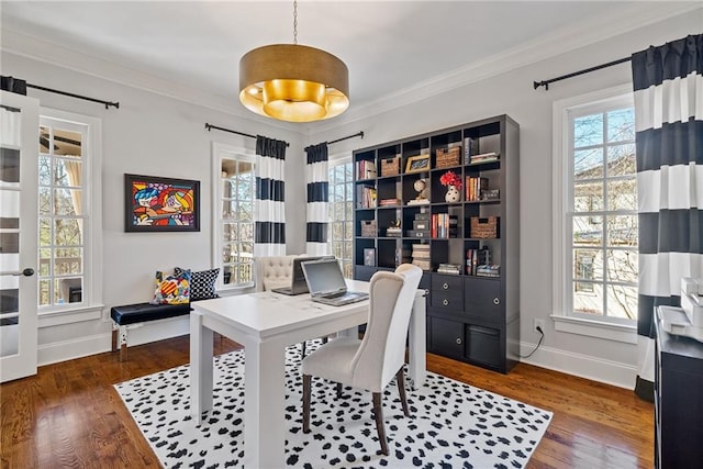 home office featuring dark hardwood / wood-style flooring and ornamental molding