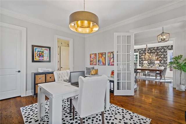 dining space with a notable chandelier, dark hardwood / wood-style flooring, ornamental molding, and french doors