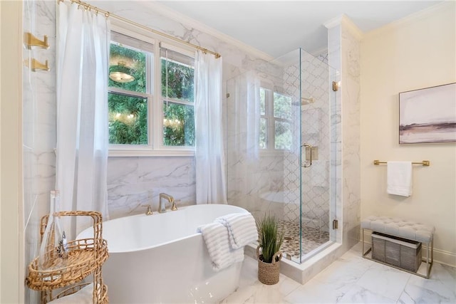 bathroom featuring crown molding and shower with separate bathtub