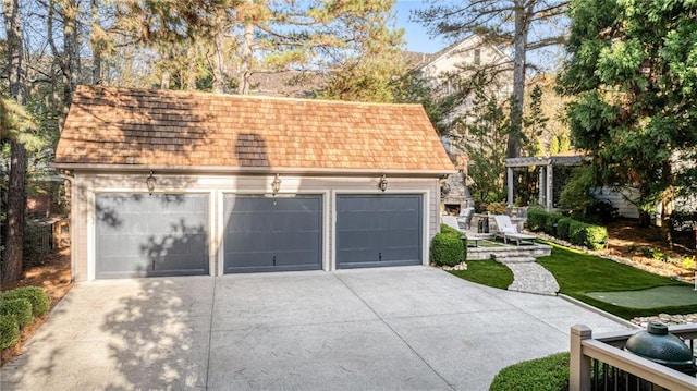 garage featuring a yard