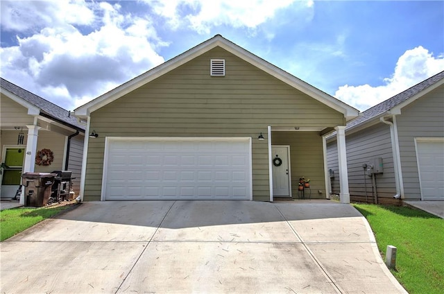 46 Courtyard Ln, Cartersville, GA 30120 - view of front of home featuring driveway and an attached garage