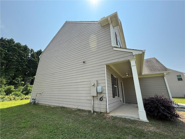 837 Castilla Way, Winder, GA 30680 - view of side of property with a lawn and a patio area