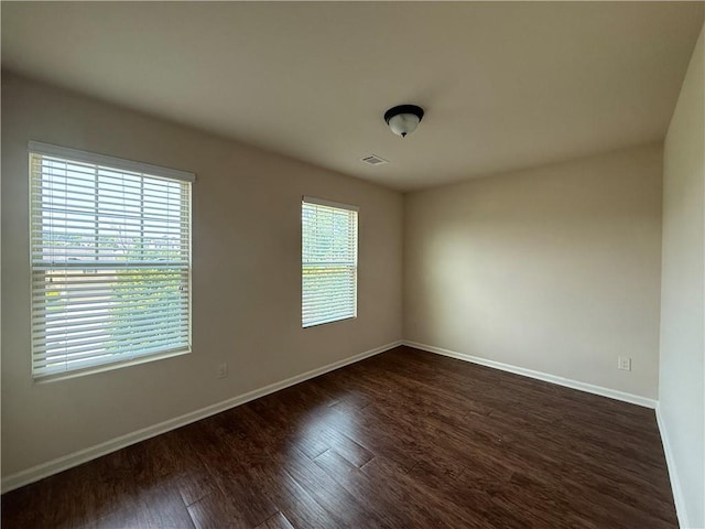 837 Castilla Way, Winder, GA 30680 - unfurnished room with dark wood-style floors and baseboards
