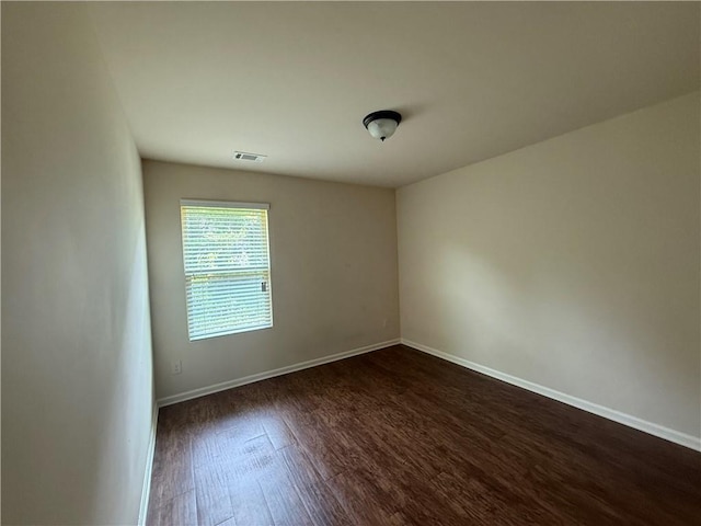 837 Castilla Way, Winder, GA 30680 - unfurnished room with dark wood-style floors and baseboards