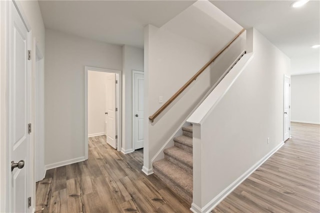 unfurnished living room featuring light hardwood / wood-style floors