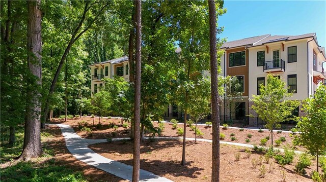 exterior space featuring stucco siding