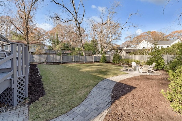 view of yard with a patio area and a fenced backyard