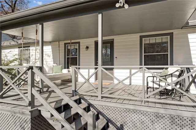 wooden deck with a porch