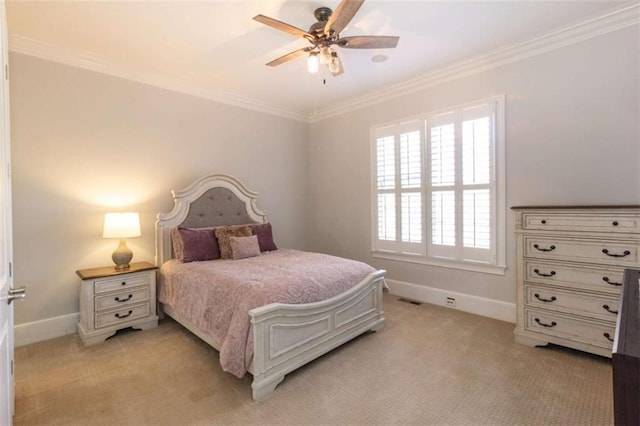 bedroom with ornamental molding, light carpet, baseboards, and ceiling fan