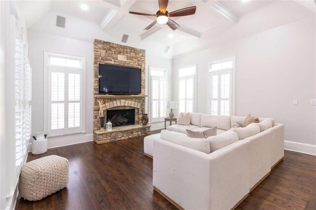 living room featuring ceiling fan, coffered ceiling, baseboards, beam ceiling, and a fireplace