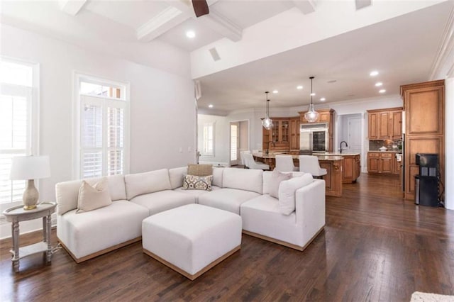 living room with recessed lighting, beam ceiling, ceiling fan, crown molding, and dark wood finished floors