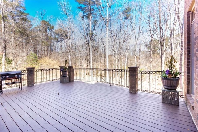 wooden terrace with grilling area