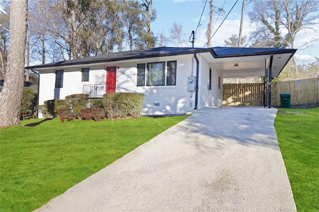 single story home featuring a front lawn and a carport