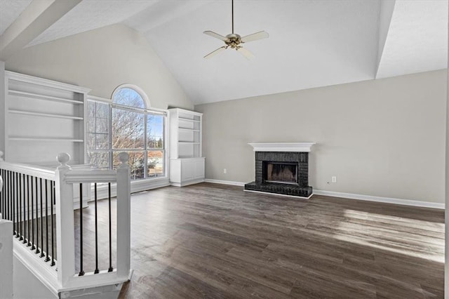 unfurnished living room featuring ceiling fan, high vaulted ceiling, dark wood-type flooring, and a fireplace