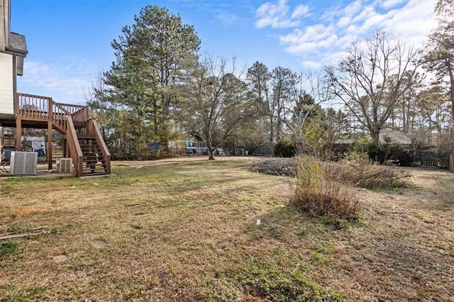 view of yard featuring a wooden deck