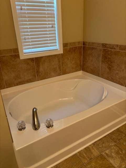 1629 Marsanne Ter, Kennesaw, GA 30152 - bathroom with a garden tub