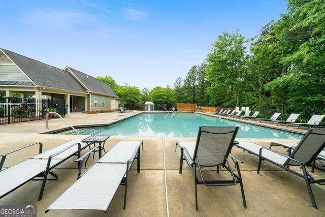 1629 Marsanne Ter, Kennesaw, GA 30152 - community pool with a patio area