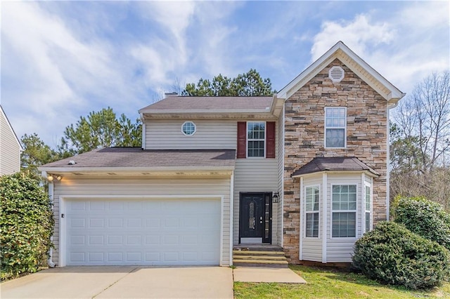 249 Bainbridge Cir, Dallas, GA 30132 - traditional home featuring stone siding, an attached garage, driveway, and a shingled roof
