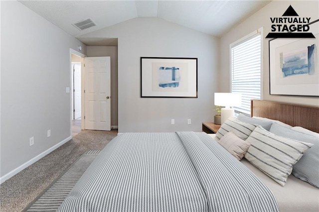 249 Bainbridge Cir, Dallas, GA 30132 - carpeted bedroom featuring visible vents, baseboards, and vaulted ceiling