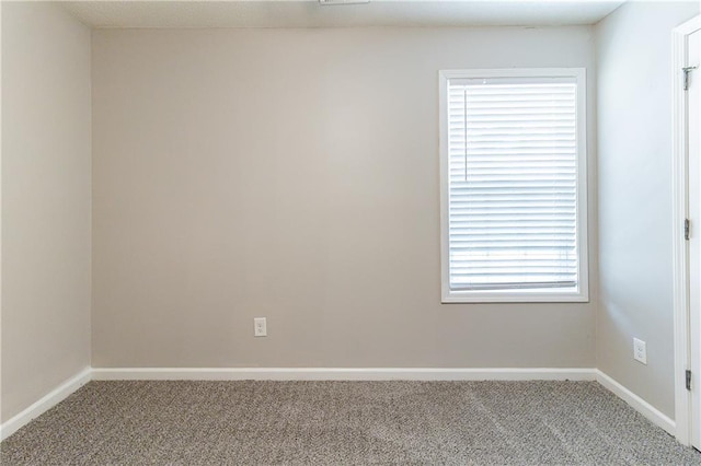 249 Bainbridge Cir, Dallas, GA 30132 - carpeted empty room with baseboards