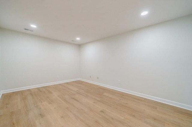 unfurnished room featuring light hardwood / wood-style floors