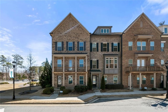 view of front of house featuring brick siding