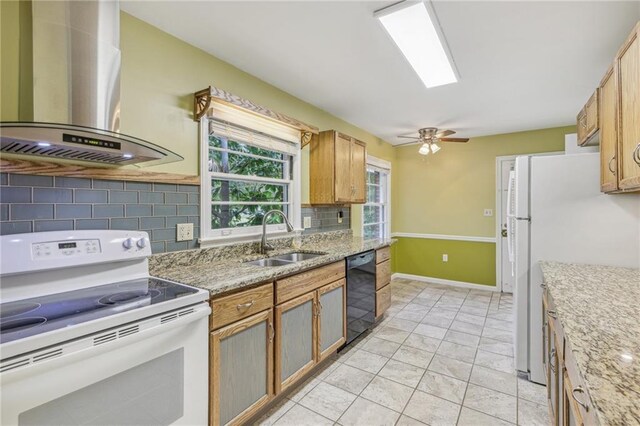 kitchen with decorative backsplash, wall chimney exhaust hood, white appliances, ceiling fan, and sink