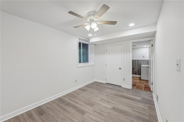 unfurnished bedroom featuring light hardwood / wood-style floors and ceiling fan