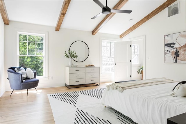 bedroom with vaulted ceiling with beams, ceiling fan, light wood finished floors, and visible vents