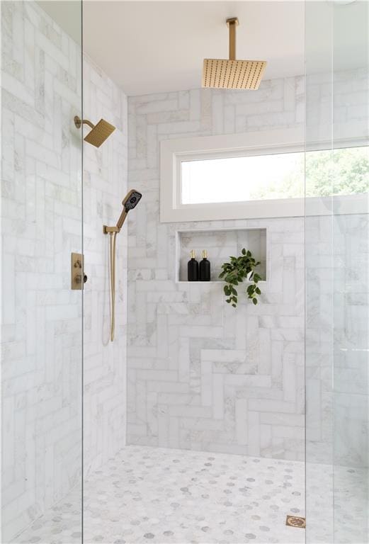 bathroom featuring walk in shower