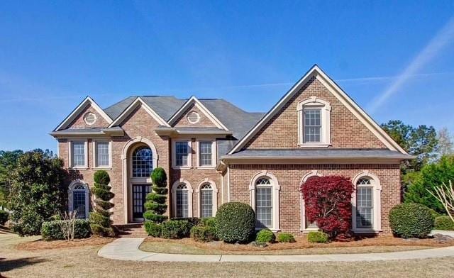 222 Chadmore Ln, Tyrone, GA 30290 - colonial-style house featuring brick siding