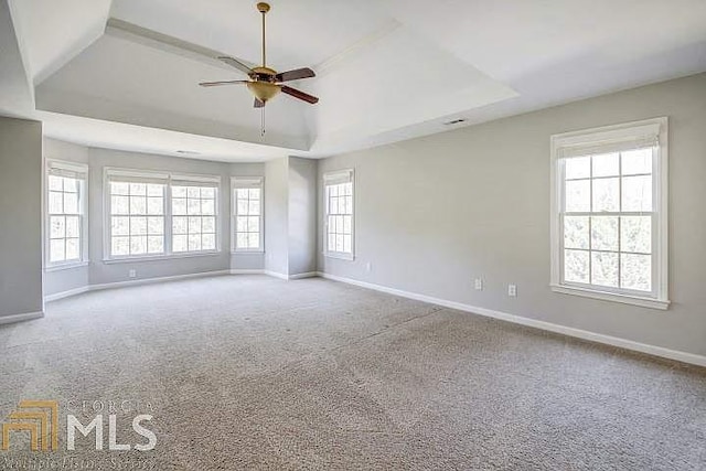222 Chadmore Ln, Tyrone, GA 30290 - carpeted spare room with a tray ceiling and ceiling fan