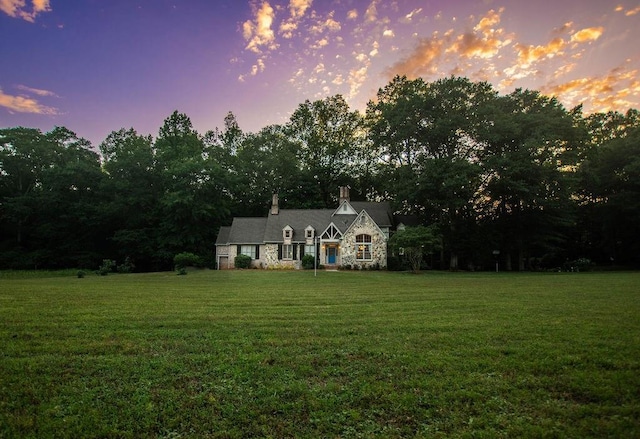 1145 Thurston Snow Rd, Good Hope, GA 30641 - view of front of house with a chimney, a front yard, and stone siding