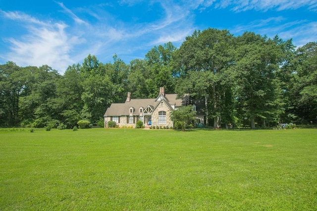 1145 Thurston Snow Rd, Good Hope, GA 30641 - view of front of home with a front lawn and a chimney