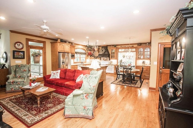 1145 Thurston Snow Rd, Good Hope, GA 30641 - living area featuring healthy amount of natural light, light wood-type flooring, ceiling fan, ornamental molding, and recessed lighting