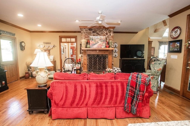 1145 Thurston Snow Rd, Good Hope, GA 30641 - living room with a fireplace, ornamental molding, ceiling fan, and wood finished floors