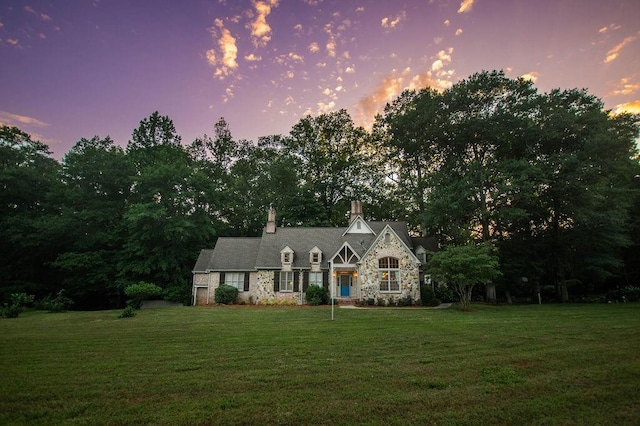 1145 Thurston Snow Rd, Good Hope, GA 30641 - view of front of home featuring stone siding, a yard, a chimney, and view of scattered trees
