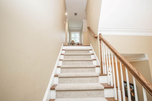 1145 Thurston Snow Rd, Good Hope, GA 30641 - staircase featuring ornamental molding and wood finished floors
