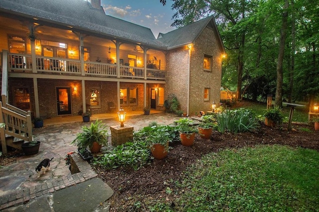1145 Thurston Snow Rd, Good Hope, GA 30641 - rear view of property featuring a patio, a balcony, and brick siding