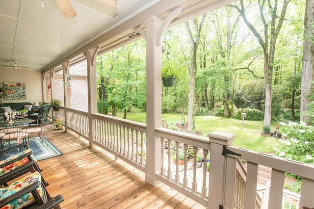 1145 Thurston Snow Rd, Good Hope, GA 30641 - wooden terrace featuring a ceiling fan, a yard, and a wooded view