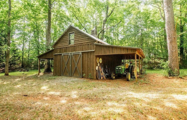 1145 Thurston Snow Rd, Good Hope, GA 30641 - view of barn featuring a view of trees