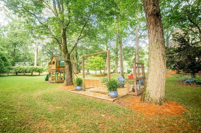 1145 Thurston Snow Rd, Good Hope, GA 30641 - view of grassy yard featuring a playground and view of scattered trees