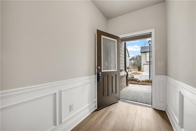 doorway to outside featuring light hardwood / wood-style flooring