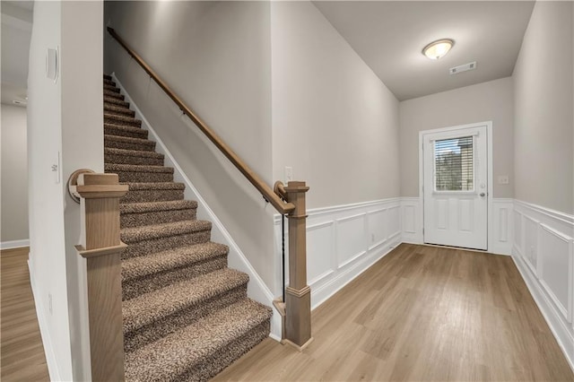 entrance foyer with light hardwood / wood-style flooring